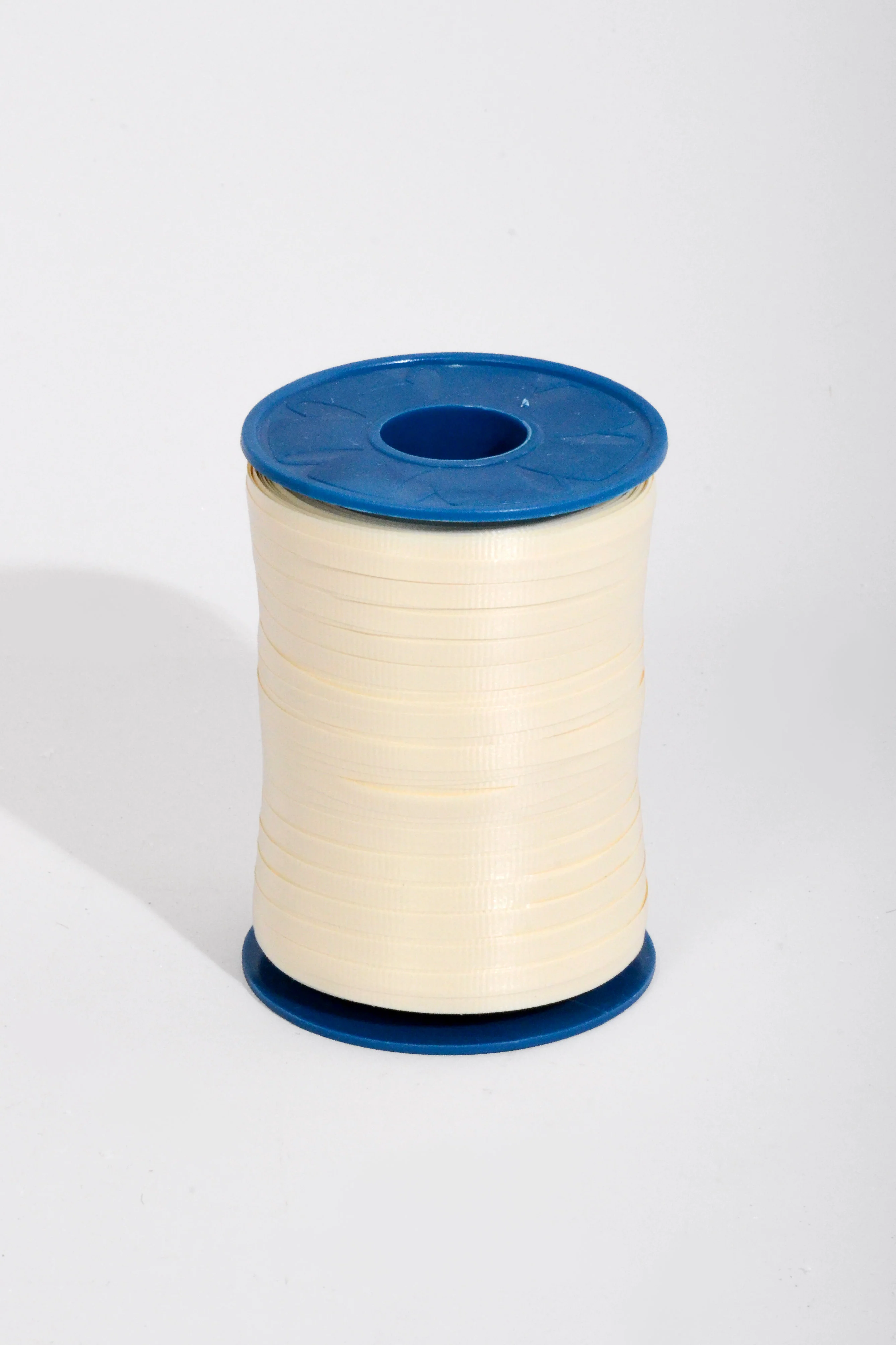 3/16" X 500Y Crimped Curling Ribbon Ivory